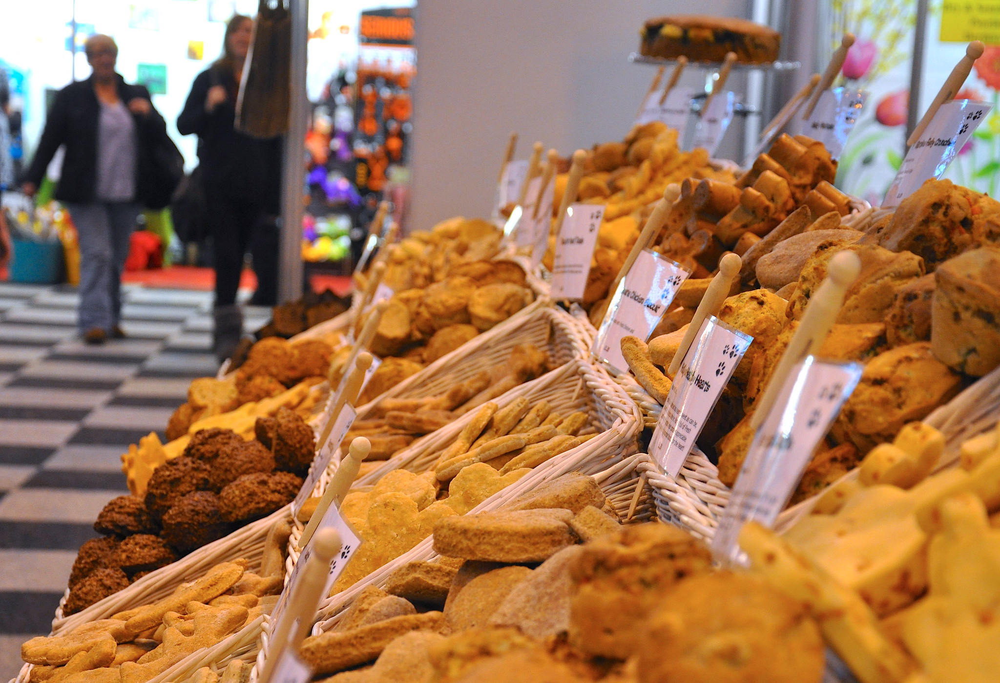 Baskets of dog treats at a welcoming pet store